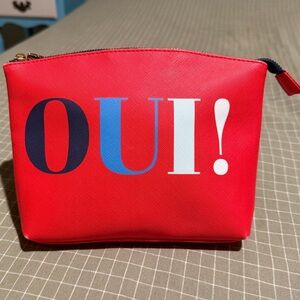 Red Cosmetic Bag with 'OUI!' Design